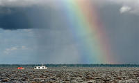Afternoon storm yields a rainbow along the Amazon River near Macapá.