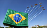 'Smoke Squadron' and a hot air balloon along the Esplanade of Brasília.