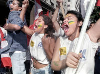 Students protest outside the Bourse in Rio during a privatization auction.