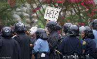 Protesters corralled during IMF and World Bank meetings.