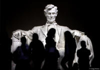 Visitors eyed by President Abraham Lincoln at his namesake memorial.