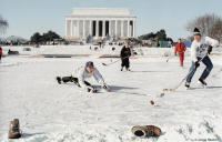Hockey enthusiasts play on the frozen Reflecting Pool near the Lincoln Memorial.