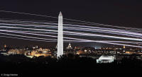 Jets streak past the Washington Monument and Jefferson Memorial into National Airport.