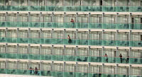 Cruise ship guests observe a Mediterranean sunset near Italy.