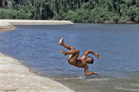 Yawalapiti indian takes a break while fishing in the Amazon.