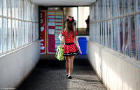 Middle School girl arrives for classes on Halloween in a Minnie Mouse motif.