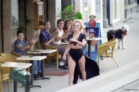 Impromptu fashion show at a café in Lyon, France.