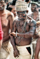 Indigenous man checks his watch in Brazil.