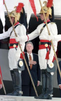 President Clinton amid honor guards in Brasília.