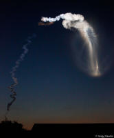 An Atlas V rocket paints the pre-dawn sky.