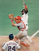 Tony Gwynn scores winning run of the 1994 All-Star Game past Ivan Rodriguez.