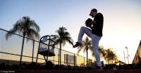 A pitcher begins his workout shortly after sunrise in Florida.