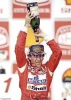 Formula One legend Ayrton Senna celebrates another victory.