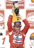 Formula One legend Ayrton Senna celebrates another victory.