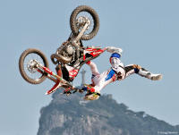 Red Bull X-Fighters rider frames the statue of Christ in Rio.