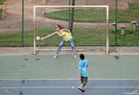 Quintessential 'soccer mom' in Brazil, high heels and all.