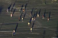 City workers during a pick-up game at dusk in the capital.