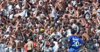 Soccer fans crushed in a stampede during the national championship game.