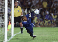 Corinthians goalie Dida saves a penalty kick to win the FIFA Club World Championship.