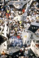 Santos FC supporters cheer their club at Morumbi Stadium.