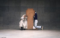 A priest listens to a confession at the Cathedral of Brasília.