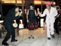 Secretary of State Condoleezza Rice with Brazilian musicians Carlinhos Brown and Gilberto Gil.