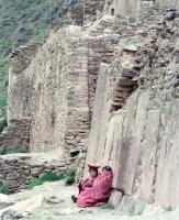 Quechua women rest near Ollantaytambo in Peru.