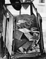 Homeless man sleeps inside his cart used for collecting scrap in Sao Paulo, Brazil.