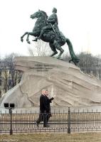 Clinton and statue of Peter the Great in St Petersburg, Russia.