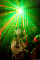 Costumed guest dances at a wedding reception.