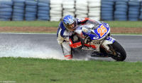 French 250cc pilot Vincent Philippe takes a wet corner at the Jacarepagua circuit in Rio.