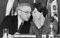 U.S. Trade Rep. Carla Hills whispers to Ambassador Richard Melton in Brazil.